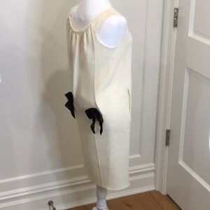 Oscar de la Renta Cream, sleeveless, dress w/ pockets,  and black satin bows